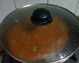 A picture of step 11 of Aloo Matar Curry.