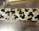 A picture of step 6 of Mickey Mouse Roll Sushi.