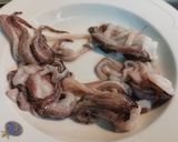 Foto del paso 1 de la receta Calamares confitados en Aceite de oliva virgen extra