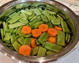 A picture of step 2 of Boiled Green Beans and Carrots.