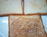 A picture of step 2 of Cheesy Banana Peanut Butter Toast.