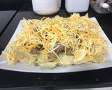 A picture of step 4 of Nachos with Cheese and Beef.