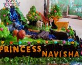 A picture of step 15 of Blackforest jungle theme cake.