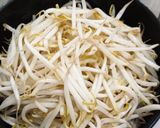 A picture of step 2 of Sambal bean sprouts with fish cake and fried tofu puff.