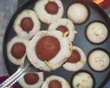 A picture of step 7 of Mini Gulab Jamun Cake in Appe Pan.