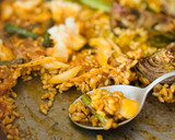 Foto del paso 6 de la receta: Paella de rape, ajos tiernos, espárragos y alcachofas 🥘 🧔‍♂️