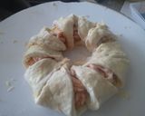 A picture of step 5 of Chicken stuffed pizza roll #chicken contest.