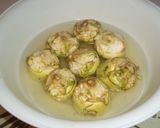 Foto del paso 4 de la receta Alcachofas hervidas rellenas de hojitas de jamón serrano