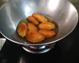 A picture of step 7 of গুজিয়া (Gujia) Shila day mandal.