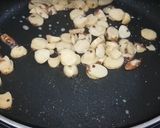 A picture of step 2 of Khed (Stir-Fried Jackfruit seeds).
