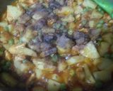 A picture of step 6 of Mazaydar or quick Aloo Matar chicken.