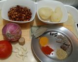 A picture of step 1 of Desi Spiced Chickpeas and Potatoes.