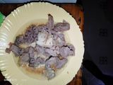 Fried nduma with beef and potato served. with spinach