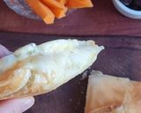 Foto del paso 5 de la receta: Sanguchito tostado de quesos Tybo y azul en sandwichera para hornalla