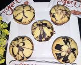 A picture of step 9 of Eggless marble cup cake.