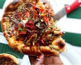 A picture of step 24 of Twisted Russian pizza.
