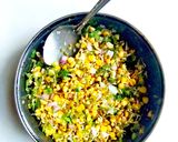 A picture of step 2 of Pizza toast with grilled corn salsa.