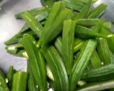 A picture of step 1 of Spicy schezwan bhindi.
