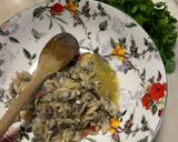 A picture of step 2 of Instant Squid Ink Risotto with Clams and Lemon Zest.