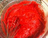 A picture of step 4 of Red velvet cupcakes🤤.