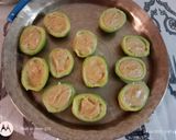 A picture of step 5 of Bhat karela pur with white sauce.
