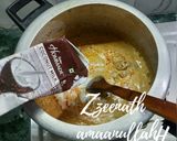 A picture of step 4 of Hyderabadi Mutton Mahi Khaliya with Coconut Milk.