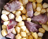 Foto del paso 3 de la receta: Patatas minis con costillas