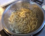 Une image de l'étape 2 de Gratin de macaronis aux poivrons grillés jambon blanc et parmesan.
