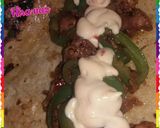 A picture of step 5 of Maxican chicken fajitas With tortillas.