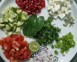 A picture of step 2 of Healthy Makhaana Salad with fruits veggies and nuts.