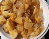 Foto del paso 2 de la receta Arroz meloso con tómate frito y bacalao
