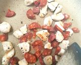 A picture of step 2 of My Chicken, Chorizo pasta dish with melted Gloucstershire cheese.