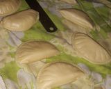 A picture of step 4 of Surprise bite (Maida/dry fruits).
