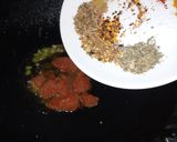 A picture of step 12 of Khatay aloo.