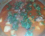 A picture of step 4 of Aloo Gosht with three Spices.