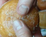 A picture of step 14 of Mardi Gras Chocolate Donuts.