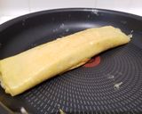 Une image de l'étape 14 de Tamagoyaki (omelette japonaise sucrée).