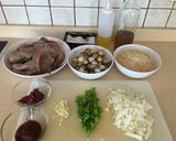 Foto del paso 1 de la receta: Arroz integral meloso con pulpo y berberechos frescos