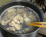 A picture of step 2 of Oyster pickled in Garlic Olive Oil.