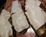 Foto del paso 8 de la receta: Berenjena rellena al microondas y sartén