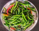 A picture of step 1 of Instant Green Chilli Pickle.