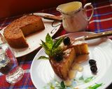 A picture of step 7 of Maize Malva Pudding drizzled with custard.