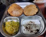 सिंघाड़ा आटा पूरी कद्दू की सब्जी और दही रेसिपी चरण 5 फोटो
