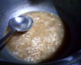 A picture of step 4 of Chicken soup with chicken sticks.