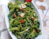 Foto langkah ke 6 dari resep Oseng kangkung saus tiram.
