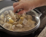 Foto del paso 9 de la receta: Alcachofas con patatas y almejas