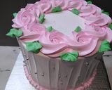 A picture of step 9 of 8 inch tall chocolate brownie cake.