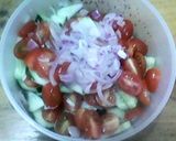 A picture of step 2 of Cucumber Tomato Salad with Lemon Chia Seed Dressing.