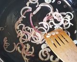 A picture of step 1 of Zuchinni Carrots Onion Stir Fry.