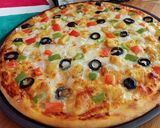 A picture of step 5 of Chicken Tikka Pizza 🍕🍕.